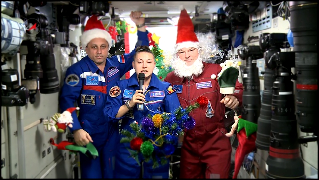 Видеоклип Космонавты с борта МКС поздравляют землян с наступающим Новым годом