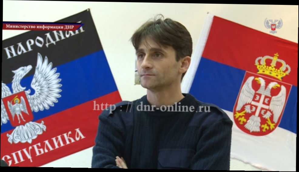 Видеоклип В Донецк вернулся Государственный флаг ДНР, побывавший в Республике Сербской